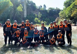 A group of people doing Body Rafting in the Gole dell'Alcantara with Sicily Adventure Taormina.