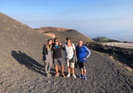 A family on Etna smiling at the camera during the Morning Jeep Tour on Etna with Tasting of Sicilian Products with Etna & Sea Excursions Catania.