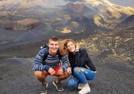 A couple on the Etna during the Day Trip with Jeep Tour on Etna and Snorkeling with Etna & Sea Excursions Catania.