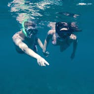 Two people snorkeling during the RIB boat trip around Caprera Island with Snorkeling with Scuba Revolution Cannigione.