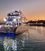 Luxury boat used on the Luxury Sunset Boat Trip to the Blue Lagoon from Ayia Napa with Ocean Queen Ayia Napa in the harbour at night.