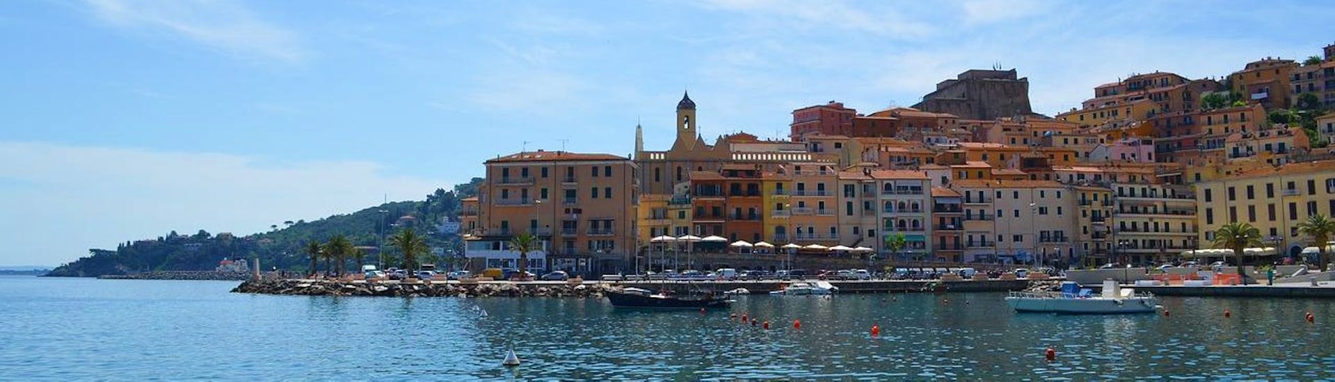 Wonderful panorama of the town Porto Santo Stefano as seen from the water during a RIB boat rental in Porto Santo Stefano (up to 3 people) with La Perla Nera dell'Argentario.