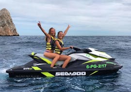 Two girls are happy to have taken part in our Jet Ski Safari along the Palamós and Calonge Coast with Lassdive.