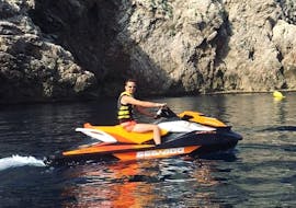 A guy enjoying during a Jet Ski Safari to Medes Islands and Montgrí Coast with Lassdive.