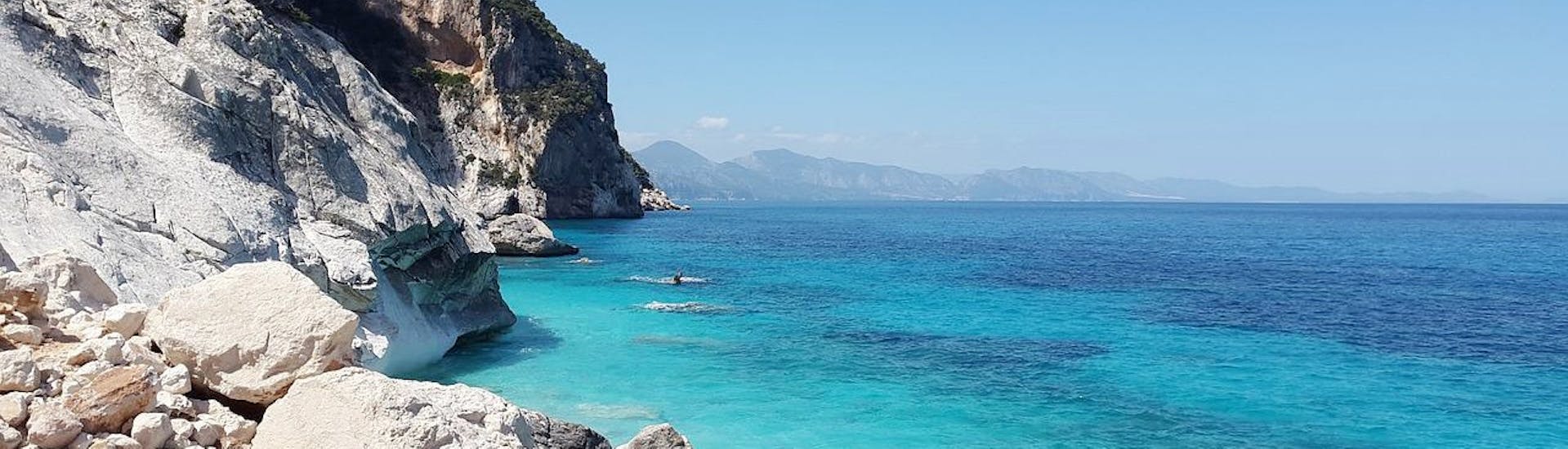 Photo of the enchanting Cala Goloritzé taken during a boat trip from Cala Gonone along the Gulf of Orosei with an aperitif with Dovesesto Cala Gonone.