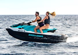 A couple having fun during a Jet Ski in St. Julian's in Malta with Rush Watersports.