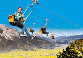 Four people during the Zipline on the Stoderzinken in Gröbming with Zipline Stoderzinken.