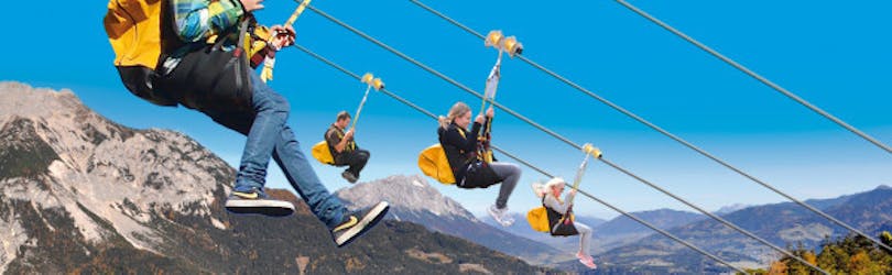 Four people during the Zipline on the Stoderzinken in Gröbming with Zipline Stoderzinken.