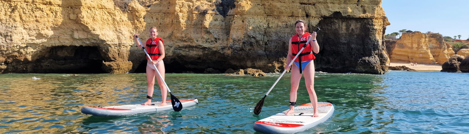 Guided Stand Up Paddling Tour from Praia dos Arrifes along the Coast.