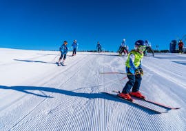 Skilessen voor kinderen (6-14 jaar) voor alle niveaus - halve dag met Scuola di Sci Folgaria - Fondo Grande.