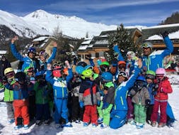 Kids having fun during the Kids Ski Lessons (3-5 y.) for Beginners with Silvaplana Top Snowsports.