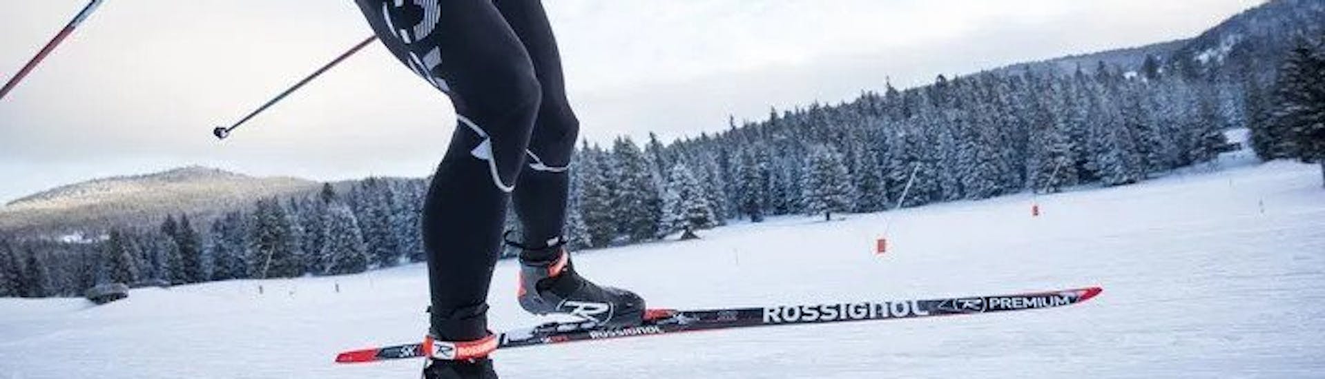 A picture of a cross-country skier in Oberstdorf learning to skate at a private cross-country course for all ages & levels.