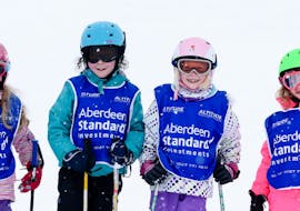 A group of kids having fun in Zermatt at the kids ski lessons (6-15 y.) for all levels with Altitude Ski School Zermatt.
