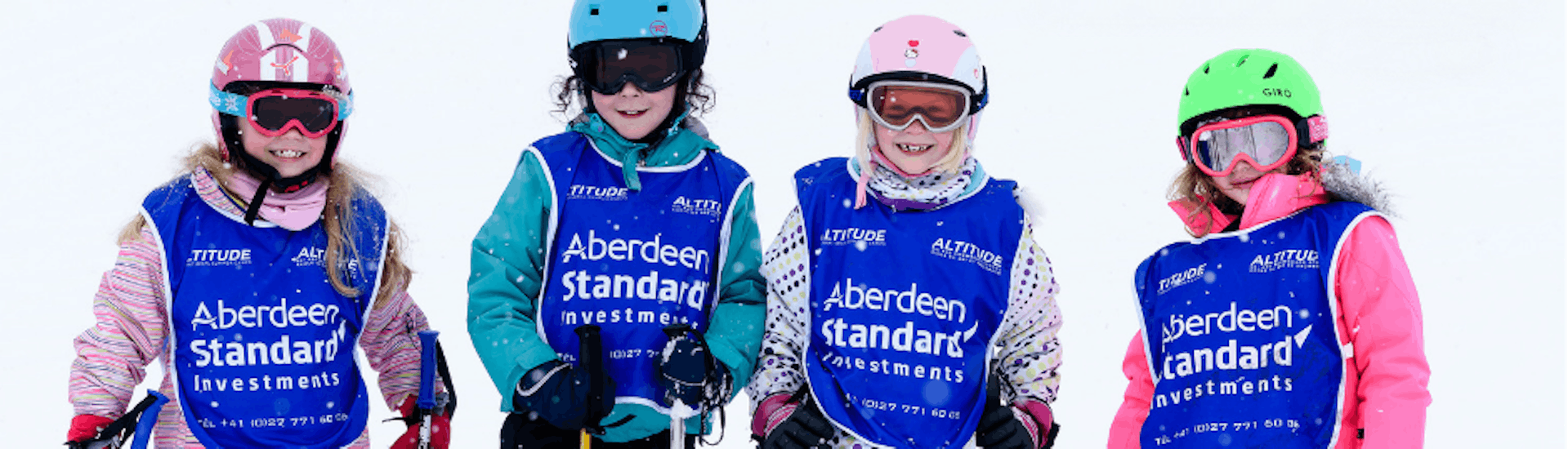 A group of kids having fun in Zermatt at the kids ski lessons (6-15 y.) for all levels with Altitude Ski School Zermatt.