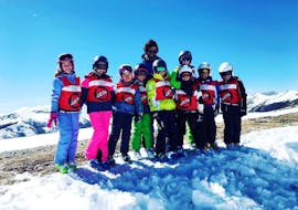 Kids having fun during the Kids Ski Lessons (4-12 y.) for All Levels with Scuola Sci Le Aquile Campo Felice.
