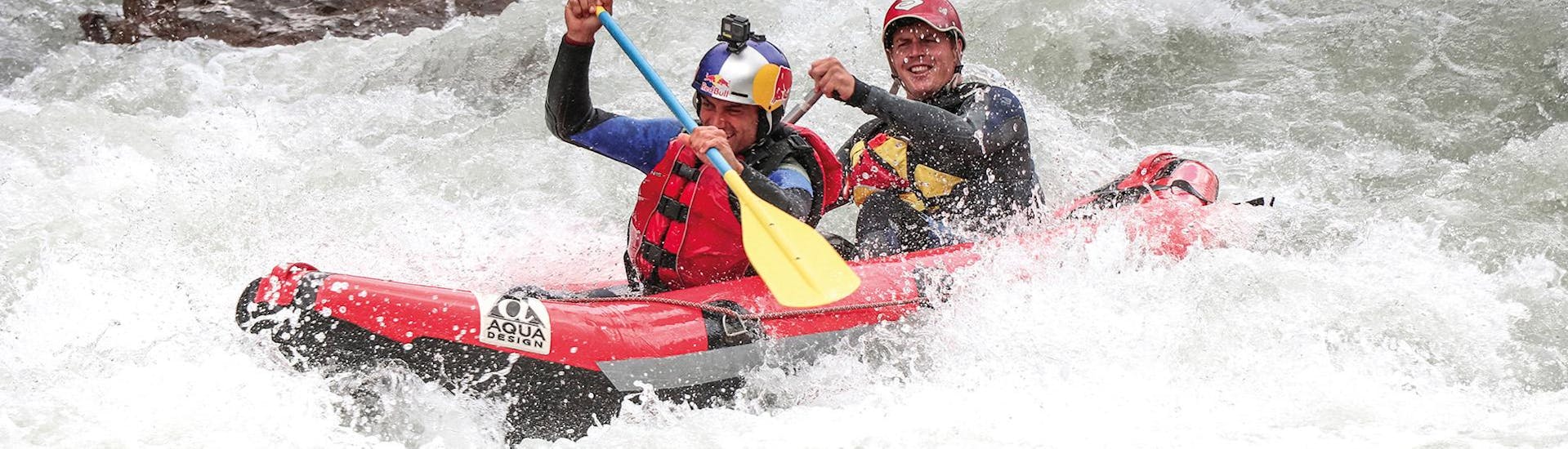 A tandem in the whitewater during the Tandem Rafting on the Lütschine River in Interlaken with Outdoor Switzerland AG.