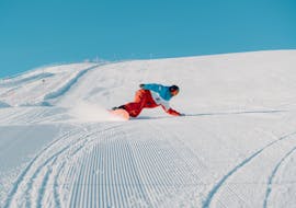 Privé snowboardlessen vanaf 6 jaar voor alle niveaus met Heli's Skischule Saalbach-Hinterglemm.