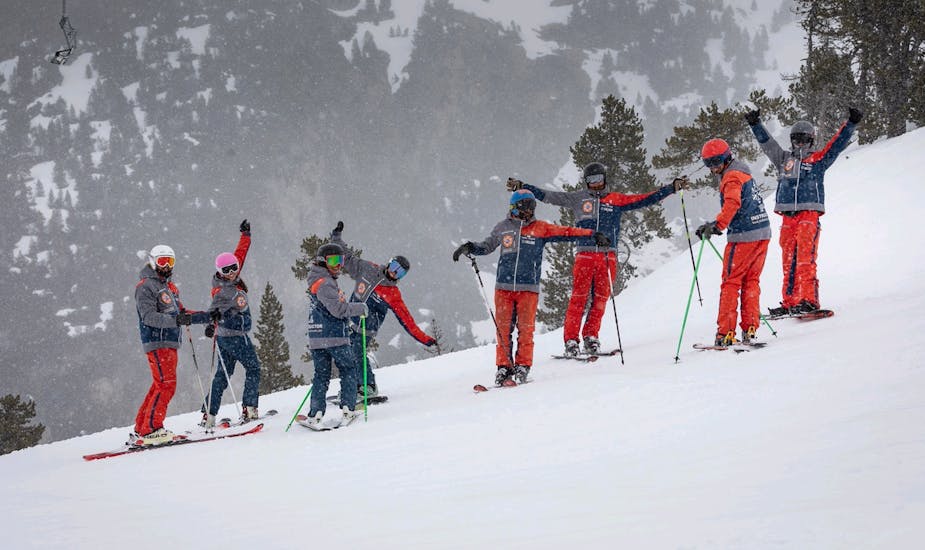 A group of ski instructors get ready for the Private Ski Guide in Baqueira Beret for advanced skiers with Ski Life Escuela de Esquí Baqueira.