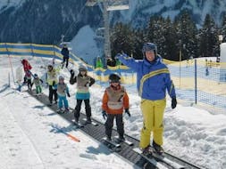 Kids Ski Lessons (6-16 y.) for Beginners from Ski School Vreni Schneider Elm.