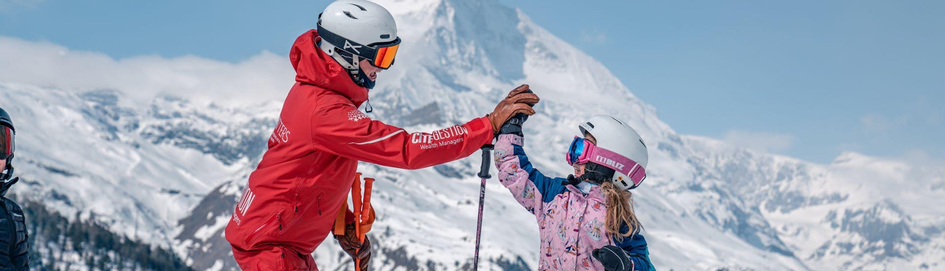 A kid is doing Kids Ski Lessons (6-14 y.) for Beginners with Swiss Ski School Zermatt - Zermatters.