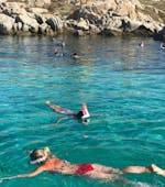 Kids are trying snorkeling during their Boat Trip to Bonifacio from Porto-Vecchio with Apéritif with Corsica Sud Croisières Porto-Vecchio.
