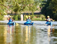Three participants on the river in their kayaks during the 9.2 km Canoe & Kayak Hire on the Schwarzer Regen - Easy with Schneider Events.