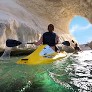 Two people exploring the coastline of Marsaskala during the Sea Kayaking in Marsaskala with Sensi Watersports Malta.