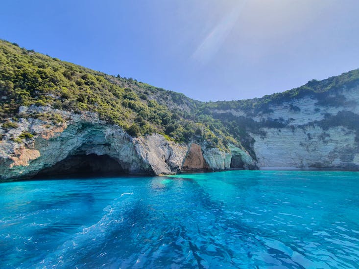 View of the Sea Caves from the boat of Kavos Cruises.