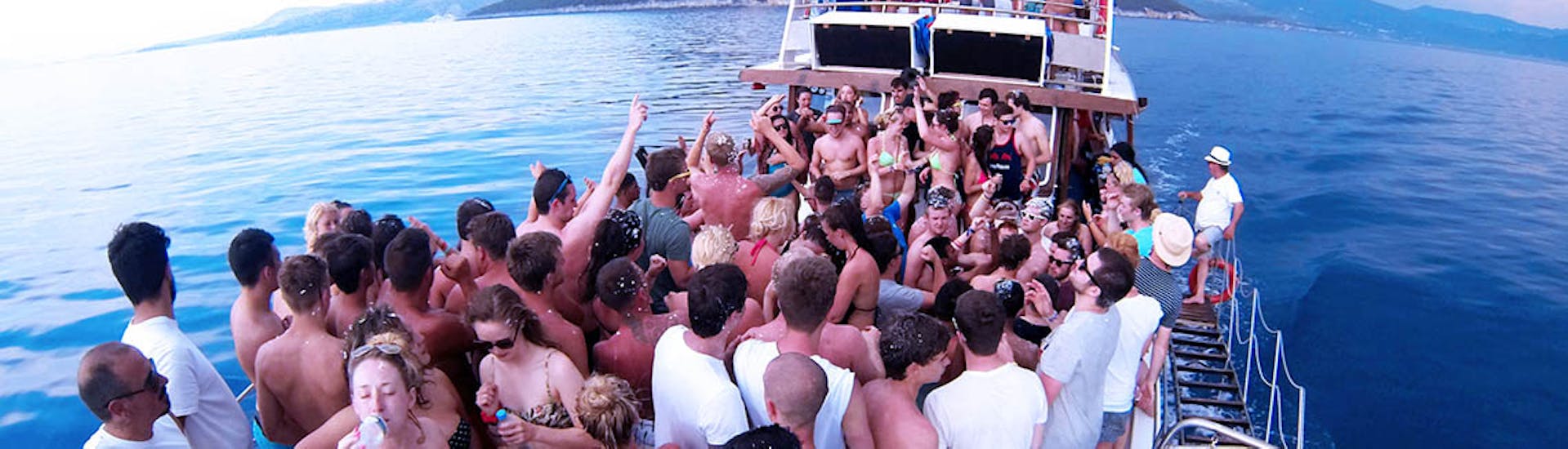 People having fun during the boat trip with Kavos Cruises.