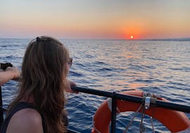 Vue du coucher de soleil depuis le bateau de Nemo Submarine.