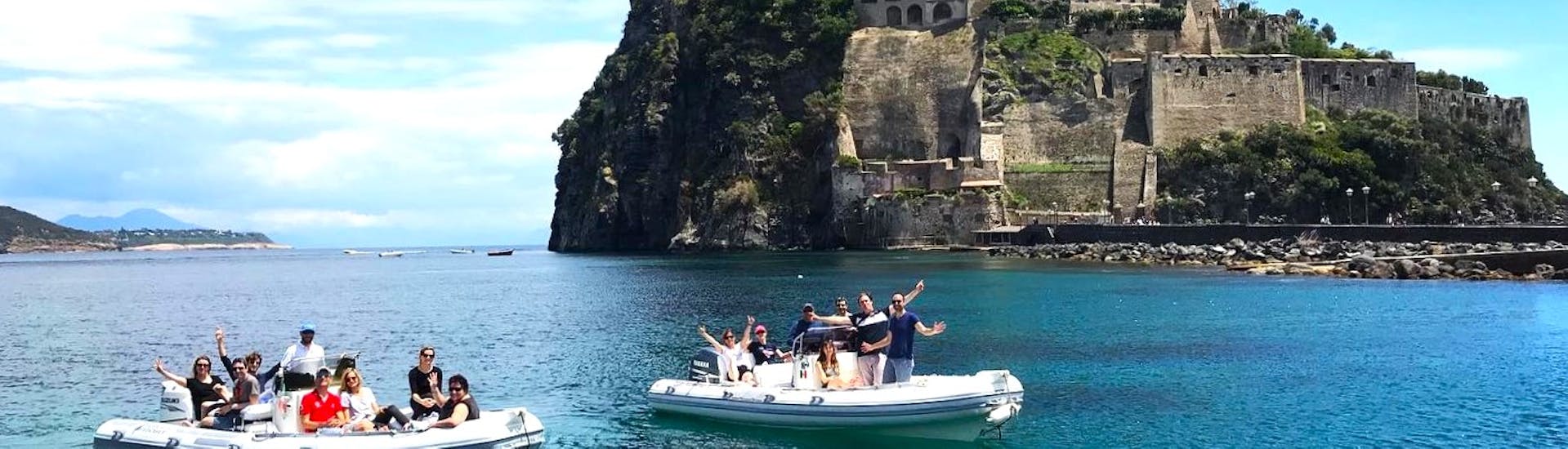 view from the sea of the Aragonese Castle that you can see during the private RIB Boat Trip to Ischia and Procida with Apéritif and Snorkeling organized by Seaside Napoli.