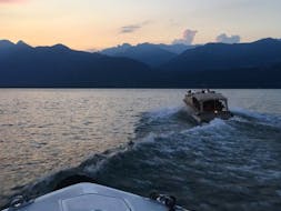 The boat of Navigazione Isole Lago Maggiore during the Boat Transfer from Stresa to Borromean Islands at Sunset.