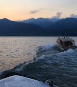 The boat of Navigazione Isole Lago Maggiore during the Boat Transfer from Stresa to Borromean Islands at Sunset.