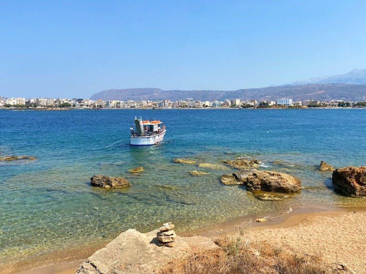 The boat from Captain Nestor stops at a beach during the Glass-Bottom Boat Trip from Chania to Lazaretta.