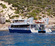 Our catamaran is going to Es Vedrà during the Catamaran Trip to Es Vedrà with Apéritif with Sea Experience Ibiza.