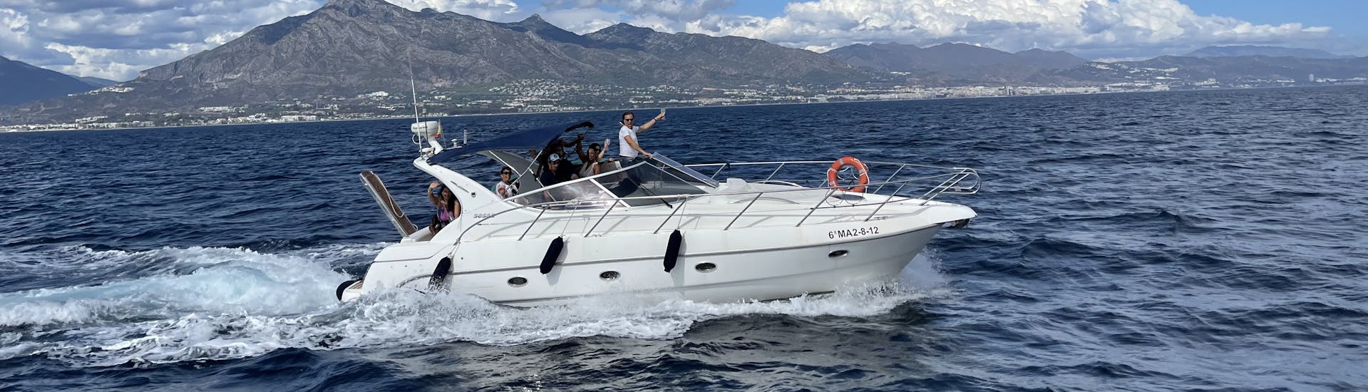 A photo of a private boat trip from Puerto Banús along Costa del Sol with Royal Catamarán Marbella.
