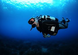 Picture of a diver in the water during PADI Open Water Diver in Ibiza by Arenal Diving & Boat Trips Ibiza.