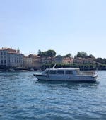 View of the Isola Bella and the boat during the Boat Transfer from Baveno to Isola Bella with Summer Boats Baveno.