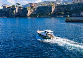 The boat from Giuliani Charter Sorrento during the Sunset Boat Trip around the Sorrento coast with Limoncello tasting.