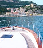 Een van de boten van Grassi Junior Positano tijdens de Privé Boottocht naar de Amalfikust vanuit Positano - Halve Dag.