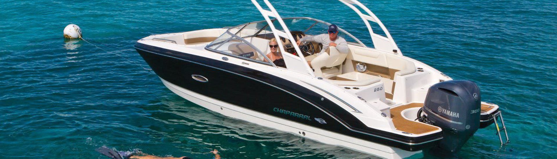 Es Vedra Charter Ibiza luxury boat rental for up to 12 people navigating around San Antonio.