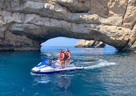 People enjoying a jet ski safari to Margarita Island with Es Vedra Charter Ibiza.