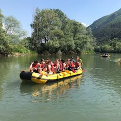 People enjoying the Rafting on the Adige River for families and friends with Xadventure Outdoor Lake Garda.