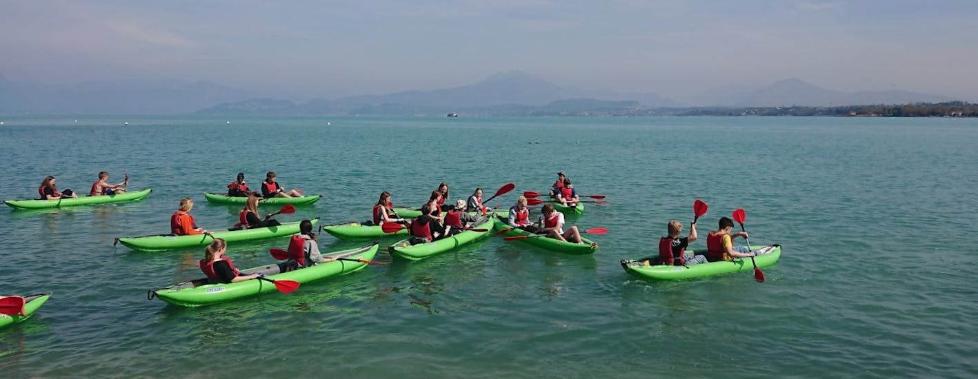 People enjoying the Kayaking on Lake Garda for Families and Friends with Xadventure Outdoor Lake Garda.
