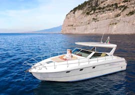 The boat of My Sorrento Holiday is navigating during the Private Boat Trip from Positano to Capri with Stop for Swimming and Snorkeling with My Sorrento Holiday.