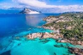 Aerial view of Tavolara Island that you can visit during the RIB Boat Trip to Tavolara Island with Snorkeling with DST Sardegna Golfo Aranci.