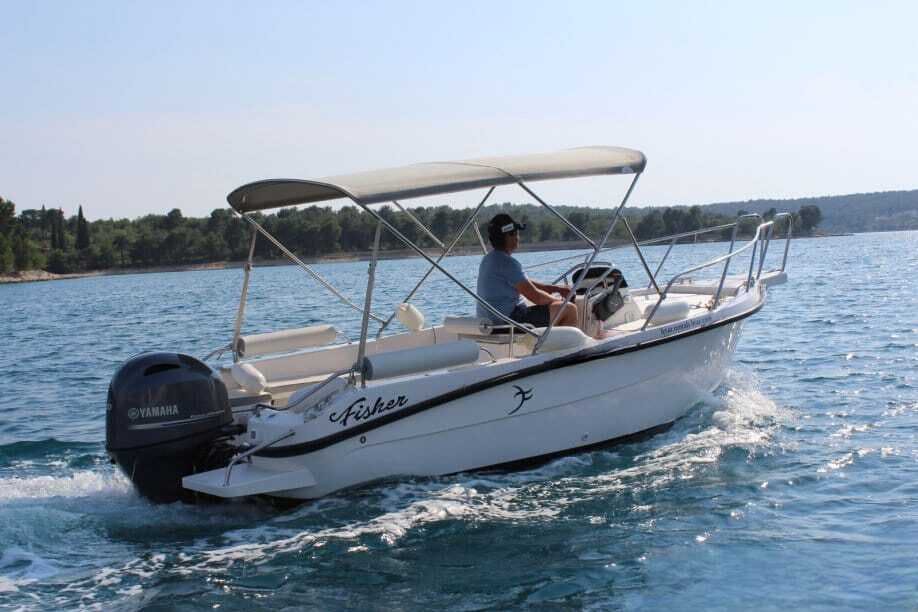 Person drives a boat of Boat Rental in Umag (up to 7 people) with Blue Gem Umag.