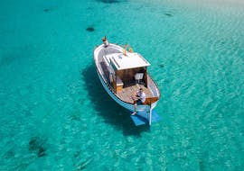 An ibicencan traditional boat trip exploring from Portinatx to Cala Xarraca during a trip of Nautipic Ibiza.