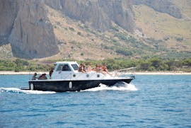 Primero's boat navigating during the Private Boat Trip around San Vito Lo Capo with Lunch and Apéritif with Primero.
