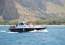 Primero's boat navigating during the Private Boat Trip around San Vito Lo Capo with Lunch and Apéritif with Primero.